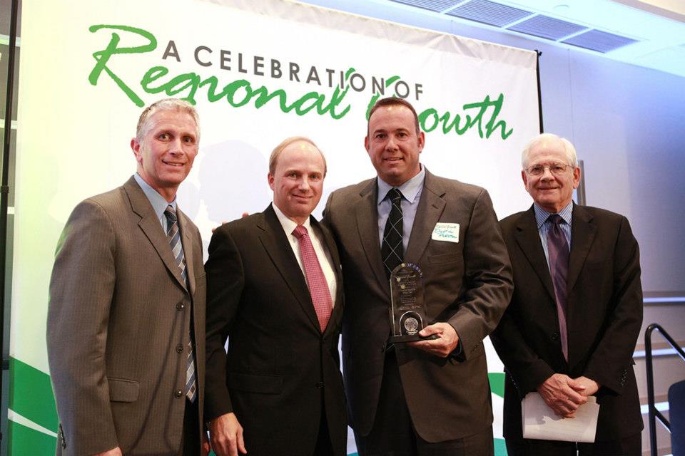 Dustin Prestin with the CORG Award Emerging Economy Award